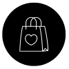 Shopping bag icon with a love heart in the centre, placed on top of a black circle